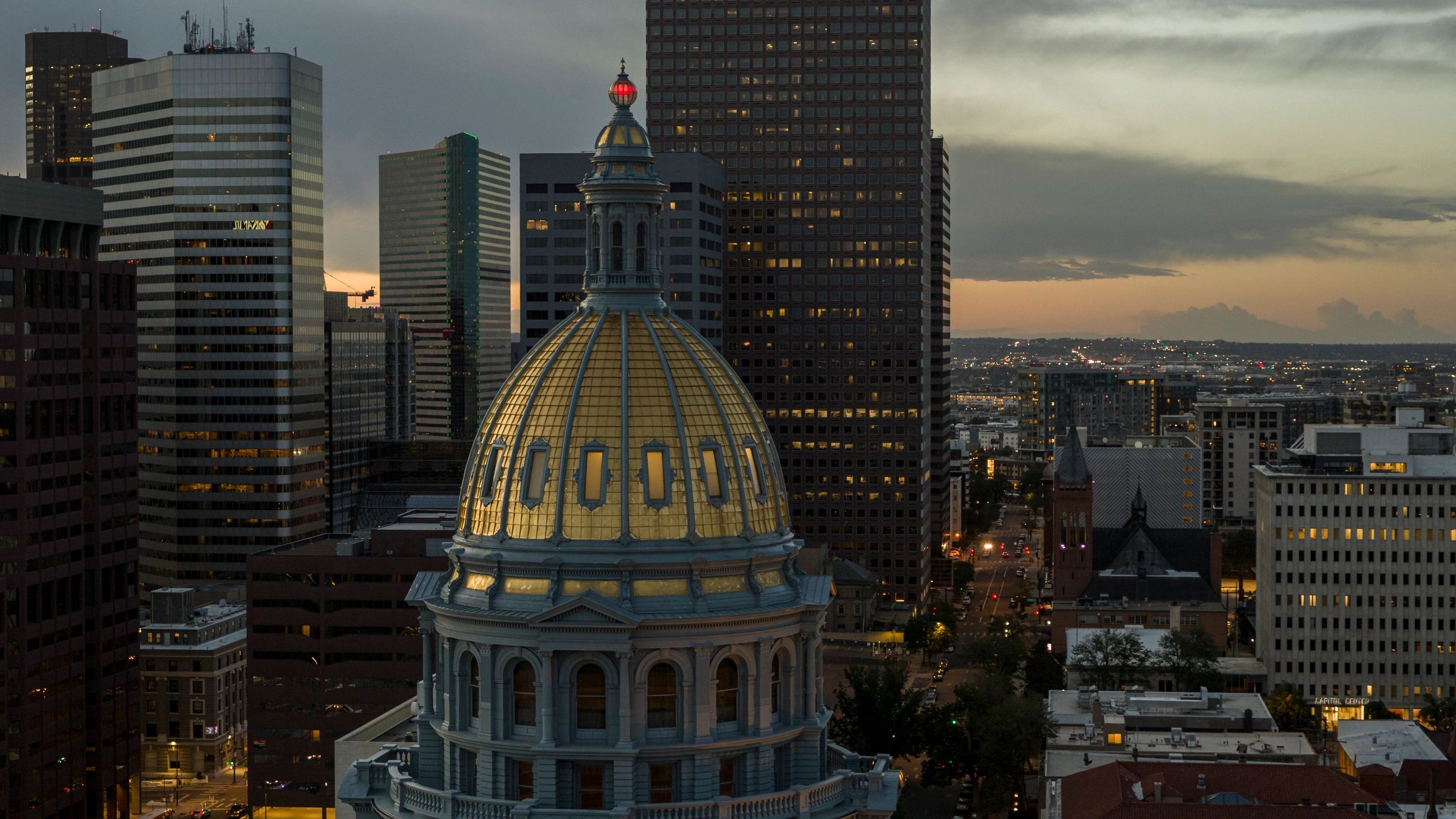 Denver skyline with Colorado State Capitol at sunset
